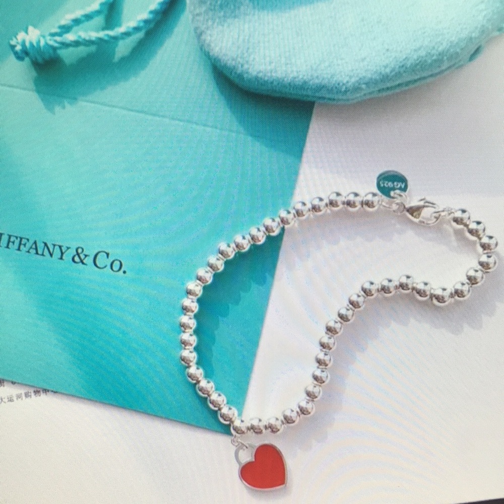 Tiffany & Co Silver Beaded Bracelet with Red Heart Charm